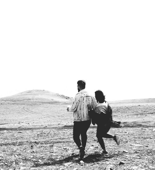 Woman feeling energetic and happy outdoors in nature.